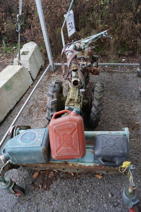 Tool carrier with mower and 3 jerrycans IROS