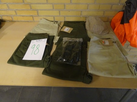 3 pairs of dark green trousers size 38, 3 pairs of beige pants size 38, mittens and a hat etc.