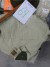 Belt, 2 pairs of beige pants size 46, 4 beige shirts size 46, 4 dark green shirts size 46 etc.