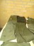 Various dark green pants. 9 pcs. size 79+ mittens and camouflage hat