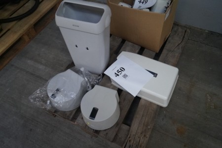 Waste bin + paper roll dispensers.