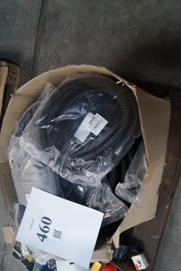 Box with various vacuum cleaner hoses.