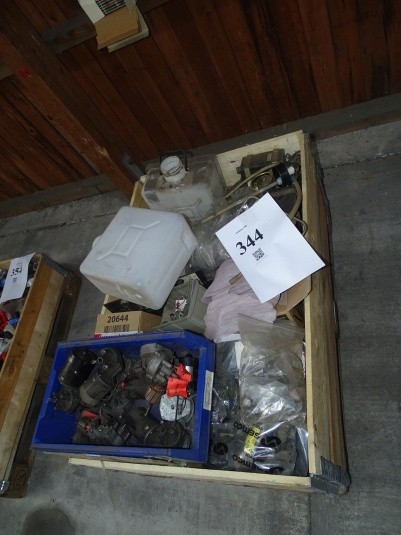 Palle with various spare parts from the welder