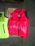 15 pcs. vest red size L, 15 pcs. green size L, 25 hooded sweatshirts small size L