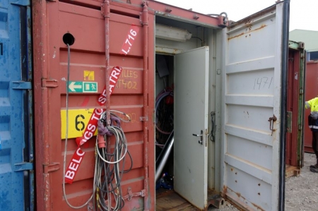 Utility Container, 20 feet. Light. Shelving . Content including welding cables, threaded rods,copper pipes, gaskets, flanges, reinforced hose, bolts, nuts, work gloves, assortment rackswith plastic boxes, hydraulic fittings, exhaust. Steel Racks with asso