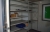 Profiled steel portable cabin storeroom 3mtr x2mtr withsliding door, 1-window, racking and contents