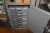 2-room locker, 4 section steel rack with content including Work gloves + steel cabinet with content