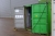 20 foot container with power containing various plastic boxes and tarpaulins