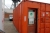 Container, 20 feet, light, heat. Shelving. Contents, including 9kw fan heater, file cabinet, electric cable, vice bench