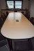 Konferencebord 420x140 cm med 16 stole.