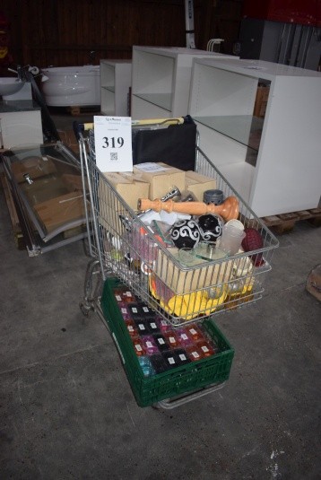 Shopping cart with various candlesticks etc.