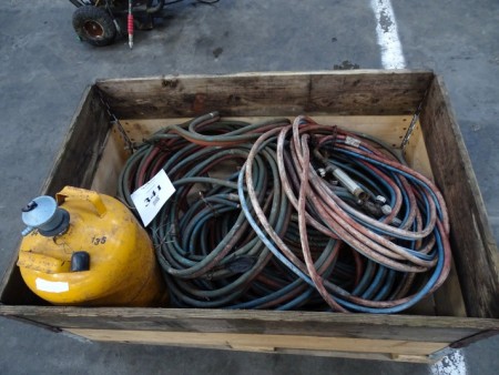 Lot of oxygen and gas hoses + gas bottle.