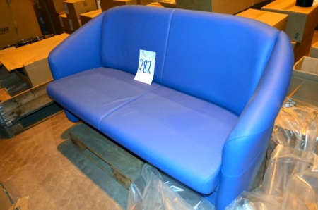 Blue leather 2-seater sofa with plinth