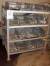 (5) Four shelf storage units with contents of assorted metric bolts, studs, nuts and fittings as lotted.