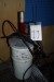Grease pump for compressed air with hose and nozzle