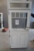 Facade door, left out, wood, white / white, H232,5xB98 cm, frame width 11,5 cm. The door can be divided into two so that the upper part can be opened one. See also catalog number 239