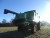 Combine harvester John Deere 9680 WTS 22 feet - Extruder - cutter - Camera - cutting table trolley - 900 Tire year 2005. hours 2600. threshing timer 1650. in good condition.