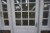 Terrassedør med vinduer i træ (hvidmalet). Bredde: 142. Højde: 230 cm.