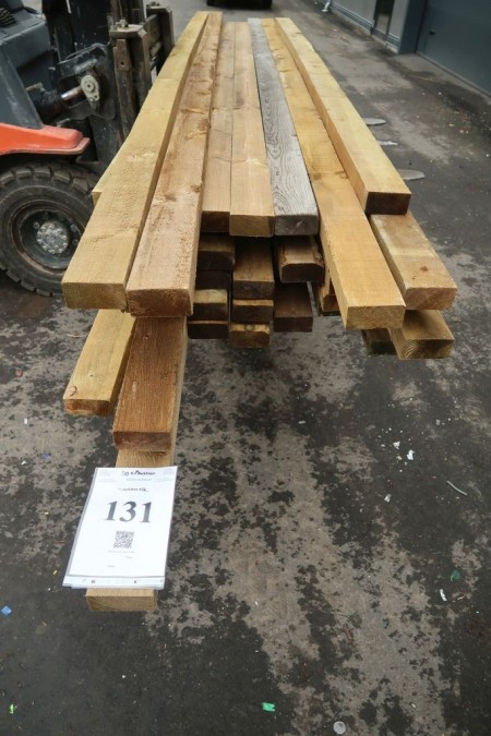 Anslået ca. 152 meter tømmer imprægneret. 55x105 mm. Længde: 240-420  cm.