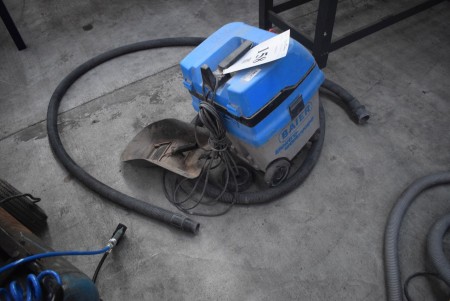Industrial vacuum cleaner with welding mask.