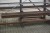Large lot of iron on 2 branch shelves.
