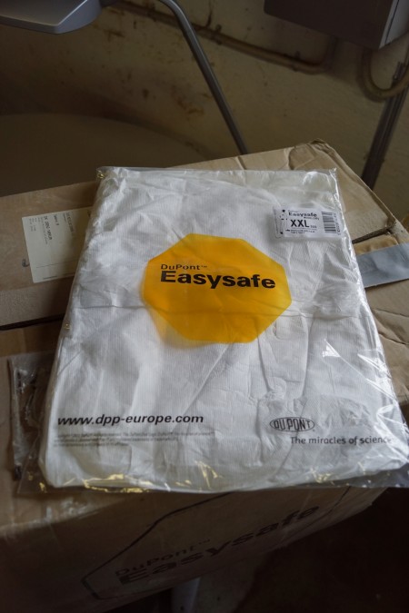 A box with disposable suits size Xxl