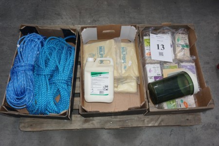 Various boxes with ropes, vacuum cleaner bags, soap dispensers, washing care etc.