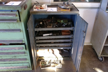 Steel cabinet with 5 shelves containing various cutting tools and machine parts, etc.