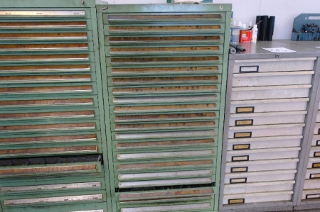Vidmar tool drawer containing various cutting tools and drill