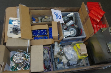 Pallet with various pumping equipment, transport wheels, etc.