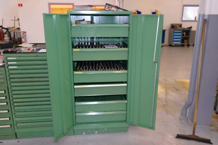 FAMI tool cabinet with pull-out drawers with content at various cutting tools, clamps, collets, guide bushings, etc.
