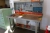 Work Bench with drawer assortment trays and tool panel containing various hand tools.
