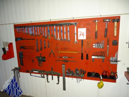 Tool board containing various tools, pullers, etc.