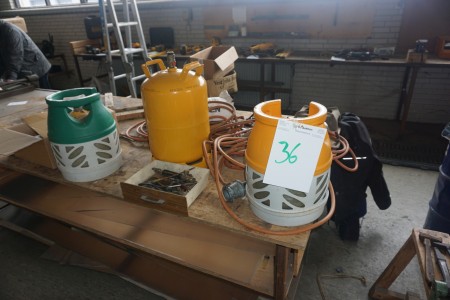 Various soldering equipment wood equipment + gas cylinders.