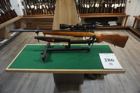 Remington model 788 caliber 243 Win with Tasco 4x40 binoculars