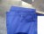 36 pairs of blue work trousers - various sizes.