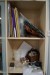 Bookcase 193x84x36 cm with glass door, with content + basket with fabric residue