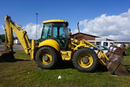 New Holland Backhoe model LB115 Starter and running year 2003. with front bucket and excavator. comes from bankruptcy estate without a minimum price.