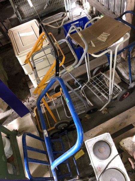 Various garbage stands and bag wagons.