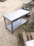 Stainless steel table with galvanized under plate. 140x70cm.