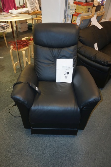 Leather Chair. With raising / lowering function.