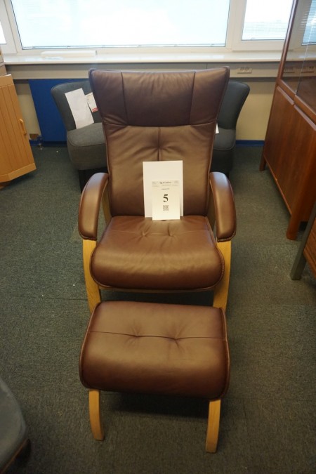 Leather chair with ottoman. Ny