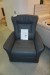 Sessel mit eingebautem Fußschemel. Marke: Hirschknoten. Farbe: Tolido Leder.