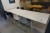 Tischlaminat mit 2 zusätzlichen Platten. 100 x 296 cm. Mit 7. verschiedenen Stühlen.