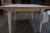 Dining table. Model 28. White melamine. 100x100x77 cm.