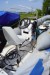 Ophalervogn l: ca 3,5 m + bådmotor mærke: Force 50 + 2 stk defekte både. 1 stk ribbåd/glasfiber + 1 stk gummibåd, motor virker, men kan ikke gå i tomgang