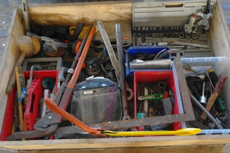 Pallet of various tools. Drills, angles, socket sets, hammer, wrench, etc.