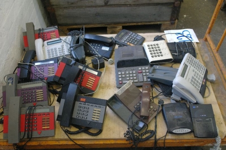 Lot of various telephones. Trolley not included.