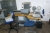 Elevating desk containing various office machinery + 3 office chairs + DPX-2000 Drafting Plotter