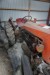Buch D30 tractor. Unknown vintage. 2 engine included. Hole in block on the engine sitting on the tractor.
